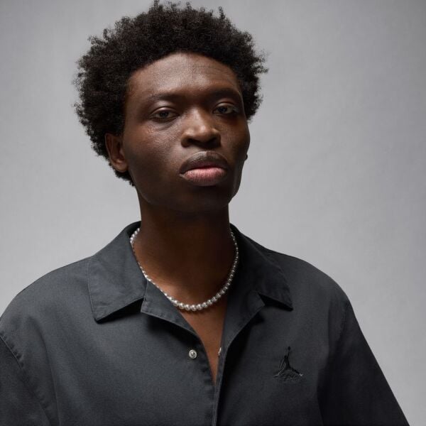 M J ESS STMT WSH TOP