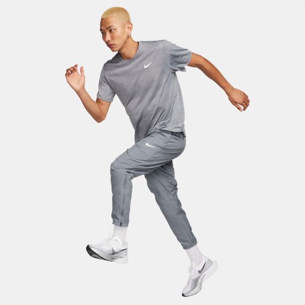 M NK DF CHALLENGR WVN PANT