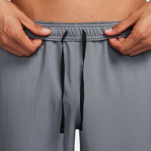 M NK DF CHALLENGR WVN PANT