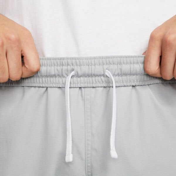 M NK CLUB CARGO WVN PANT