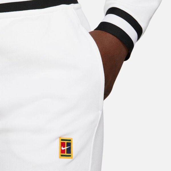 W NKCT DF HERITAGE FLC PANT