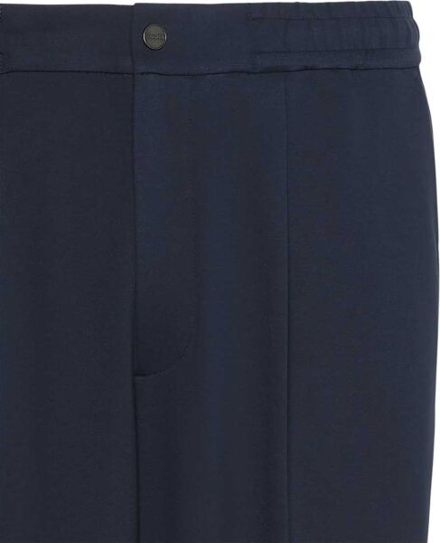 TAPERED TECH KNIT PLEATED PANT
