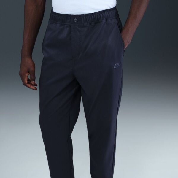 M NK CLUB WVN TAPER PANT